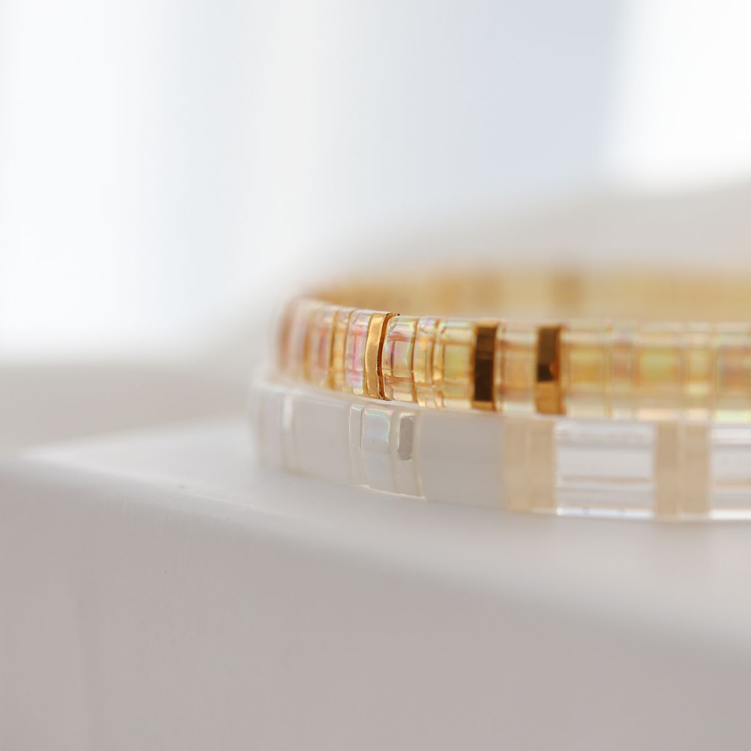 gold bracelets with white